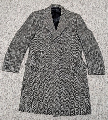 Gray wool vintage USA-made TWEED donegal overcoat with notch lapels, front button closure, and two front flap pockets.