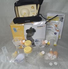 Medela Pump In Style Advanced Starter Set Breast Pump Set. New Opened Box