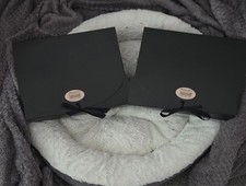 A unique set of hand crafted sented candles gifted in a box by Elizabeth Ward