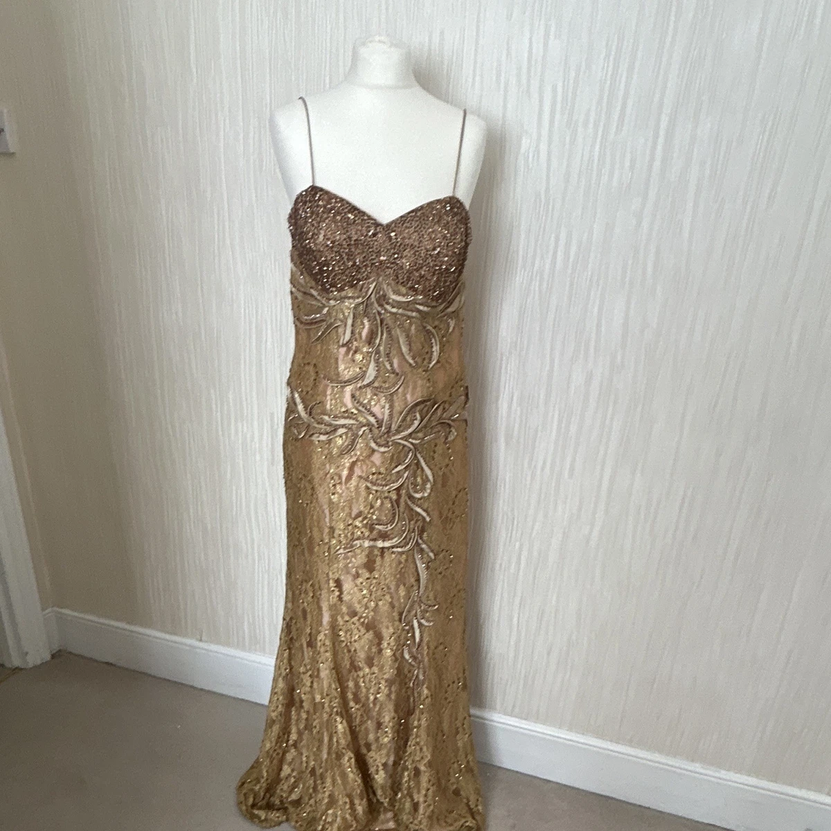 gold sequin dresses uk Nikita Gold Sequin With Black Bow Detail Mini Dress – Get That Trend main image 0
