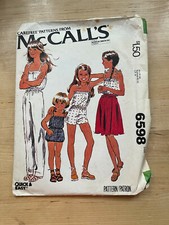 Vintage 1970s McCall's pattern 6598 girls' jumpsuit 2 lengths wrap skirt 10 cut