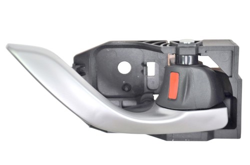 Silver Automobile Door Handle With A Leather Covered Interior Stock