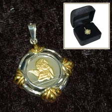 sterling Silver .925  Angel Pendent with gold detail
