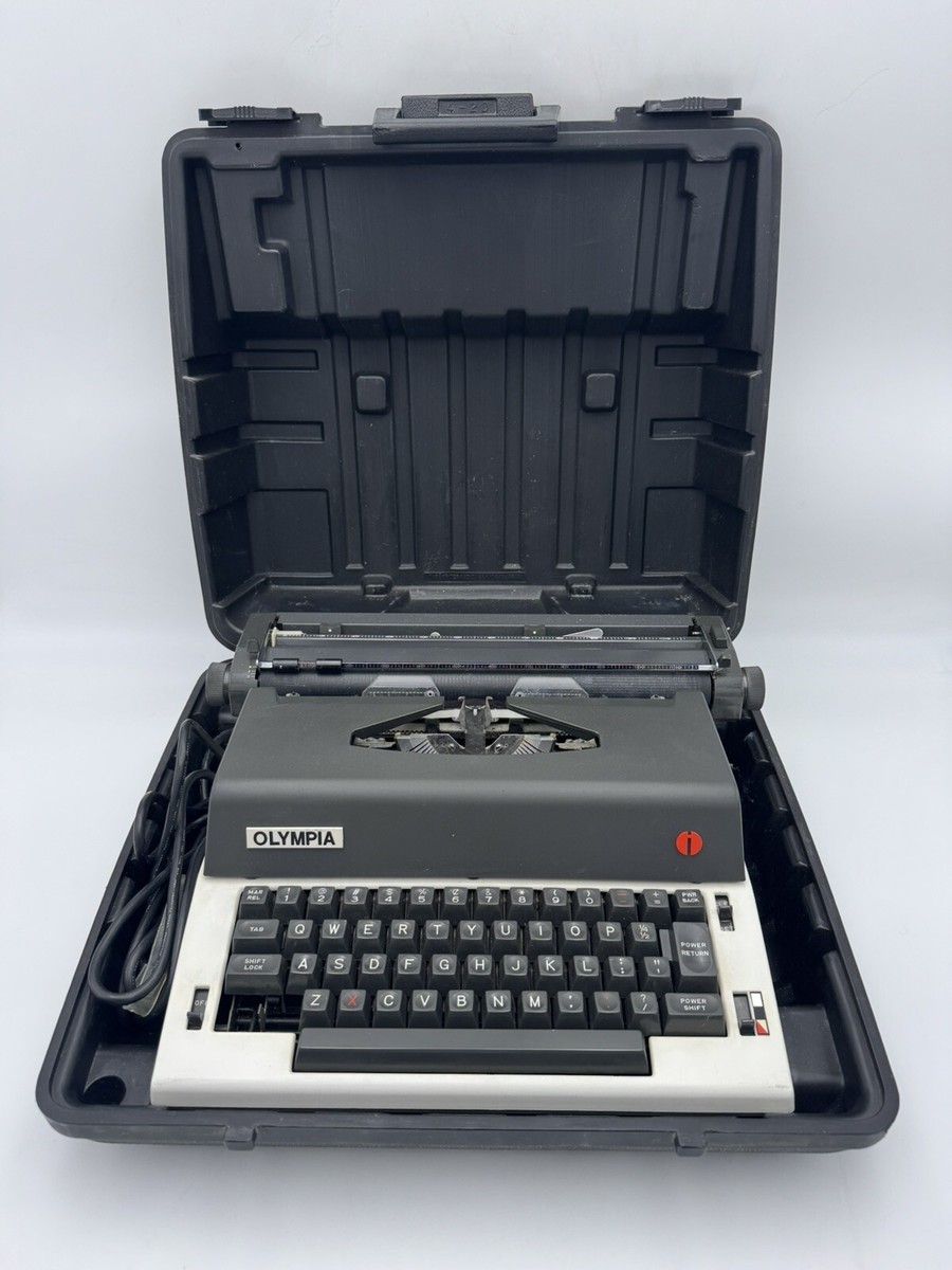 Olympia INTERNATIONAL Typewriter Electric Vintage W/ Case Model X