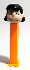 Vintage PEZ Candy Dispenser Peanuts Lucy Orange Base Slovenia