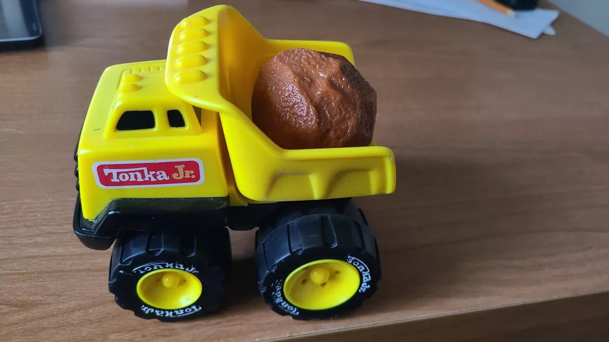 Tonka Jr. Yellow Dump Truck Rugged Plastic Retro this dump truck carries a rock