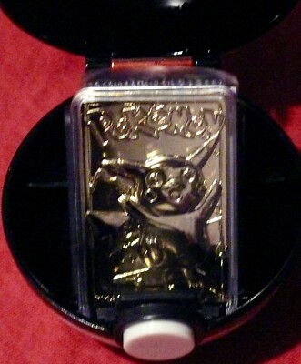 pokemon gotta catch'em all 23k gold plated trading card Togepi Gold-plated Cards by Burger King Toys Never opened I have one. Unfortunately still