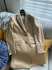 Cappotto Burberry cappotto monopetto con risvolto dentellato