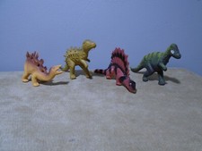 SET OF 4 MINIATURE DINOSAUR FIGURE CAKE TOPPERS MA290 