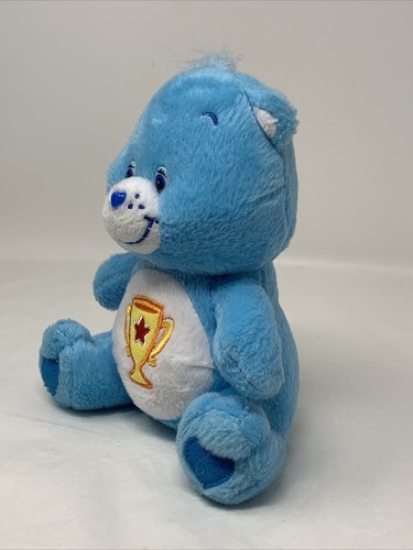 Juguete de peluche Care Bears Champ Bear azul con premio trofeo 2004 Nanco - Imagen 6 de 10