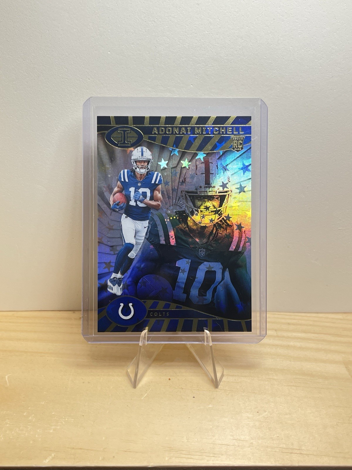 2024 Panini Illusions - Galactic Trophy #36 Adonai Mitchell (RC)