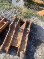 excavator thumb