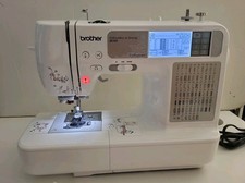 Brother SE425 Computerized Sewing and Embroidery Machine With Case.