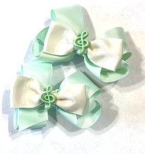 Beautiful Pale Green Treble Clef inspired set of pigtail bows for girls.