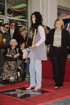 Cher holds Walk of Fame Star stands beside Chastity Bono Hollywoo- 1998 Photo