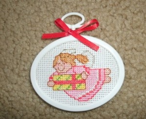 Finished completed cross stitch Angel with gift Christmas ornament