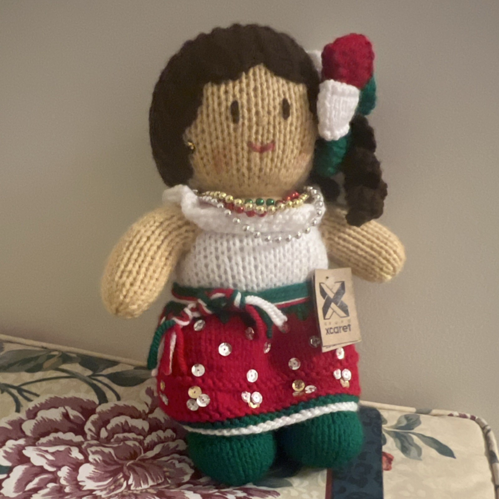 Xcaret Knitted Doll with Red Skirt and Floral Hair Accessory