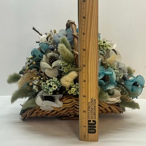 vintage basket arrangement flowers blue flowers and catails