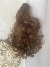 12 in Curly , Short Pony Tail Synthetic . Claw Ponytail Clip In. Light Brown