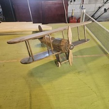 Modellino aereo in legno fatto a mano decorazione biplano. Elica mobile e ruote.