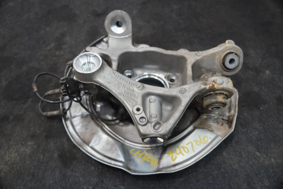 Suspensión trasera husillo izquierdo nudillo porta rueda 33306866335 BMW 540i 530i G30 Foto 4 de 4