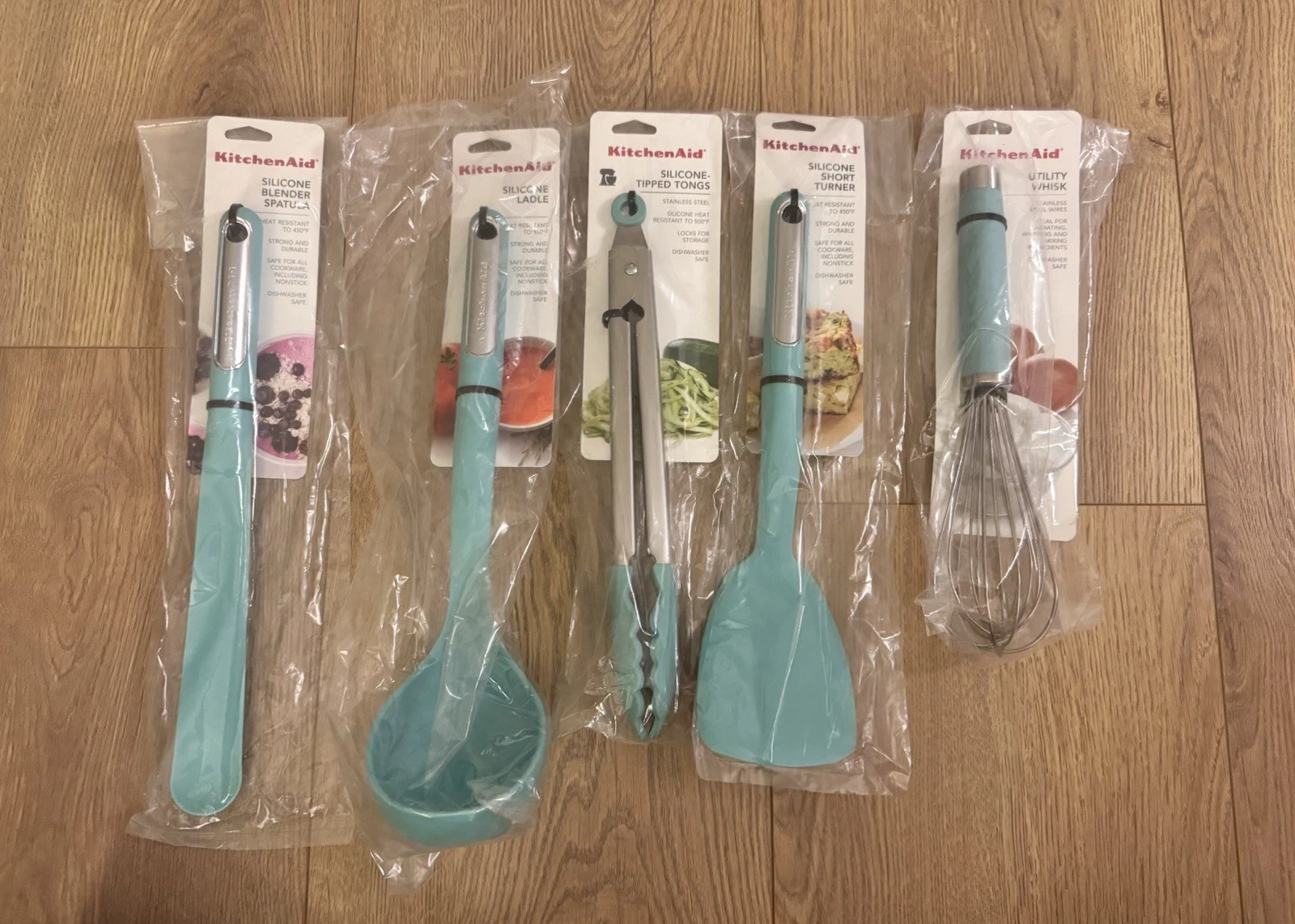 KitchenAid | Ladle, Spatula, Tongs, Short Turner And Whisk | Color: Aqua Sky.
Opens in a new window