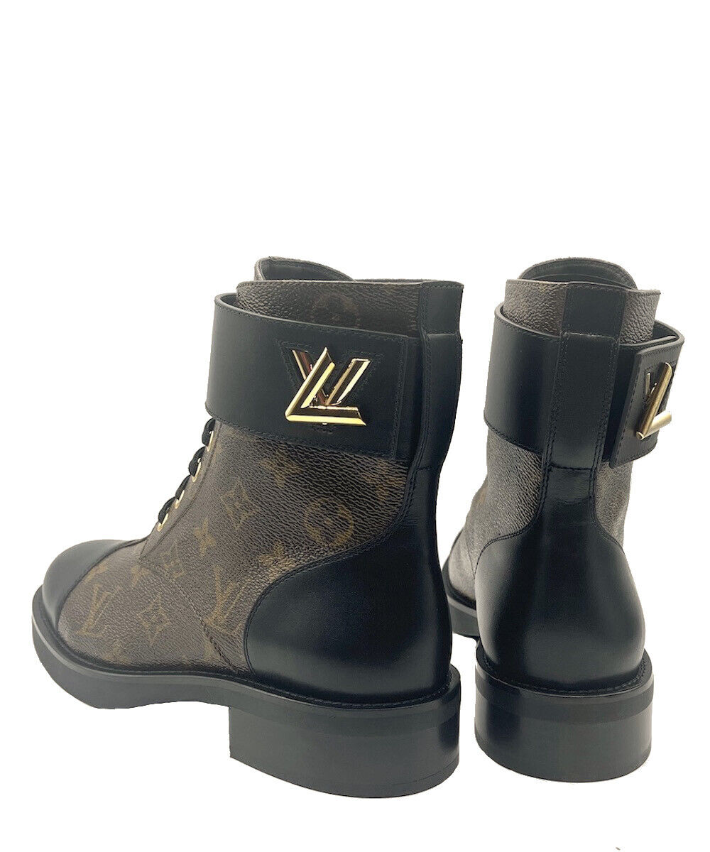 Pre-Loved Louis Vuitton Women's Black Leather Wonderland Flat Ranger Boots  For Sale at 1stDibs