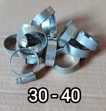 12 używanych wysokiej jakości stalowych zacisków węża napędowego na ślimaki jubilee. 30-40.