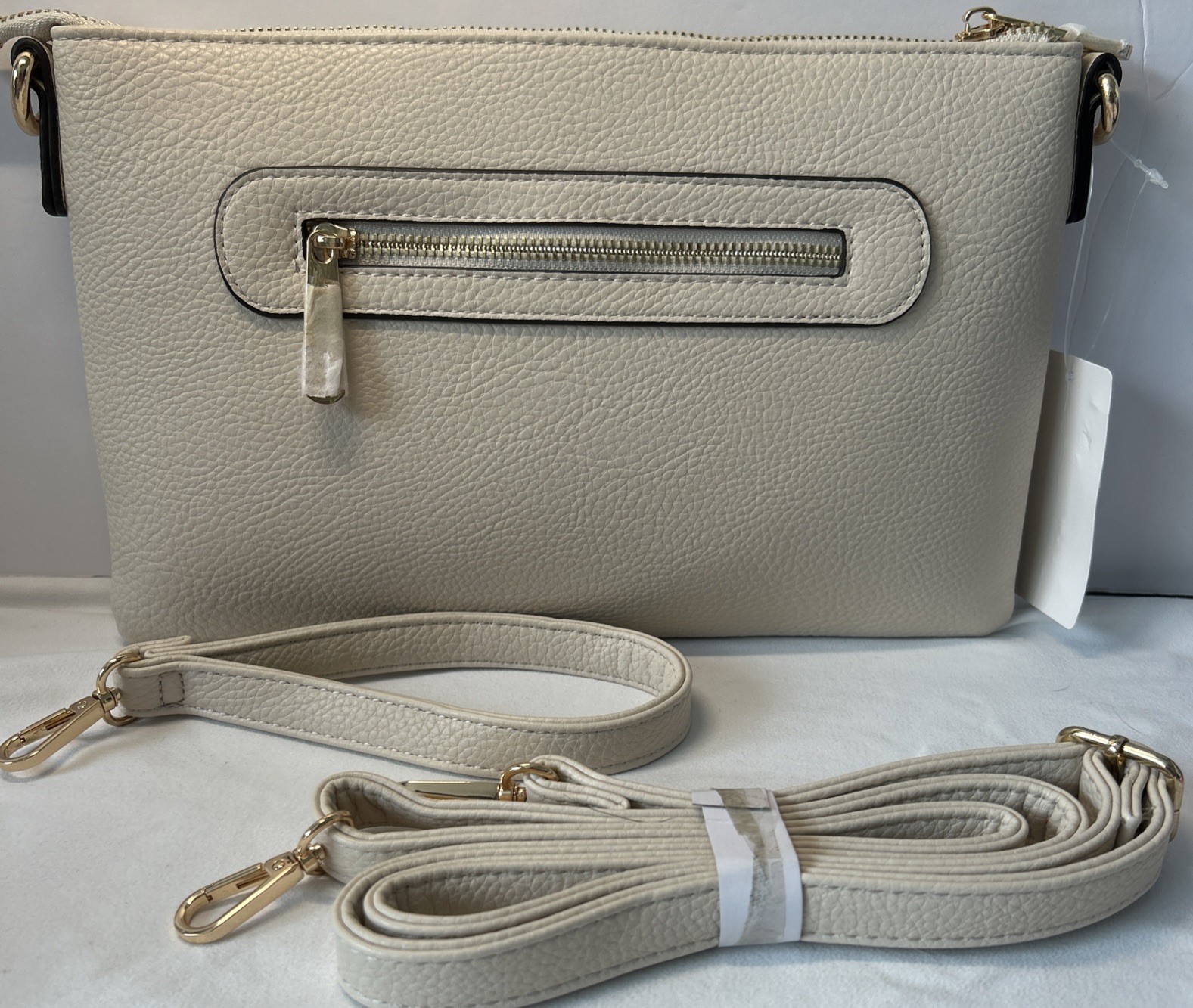 Women’s Beige clutch wristlet or shoulder bag beige Zip Closure Gold accents NWT