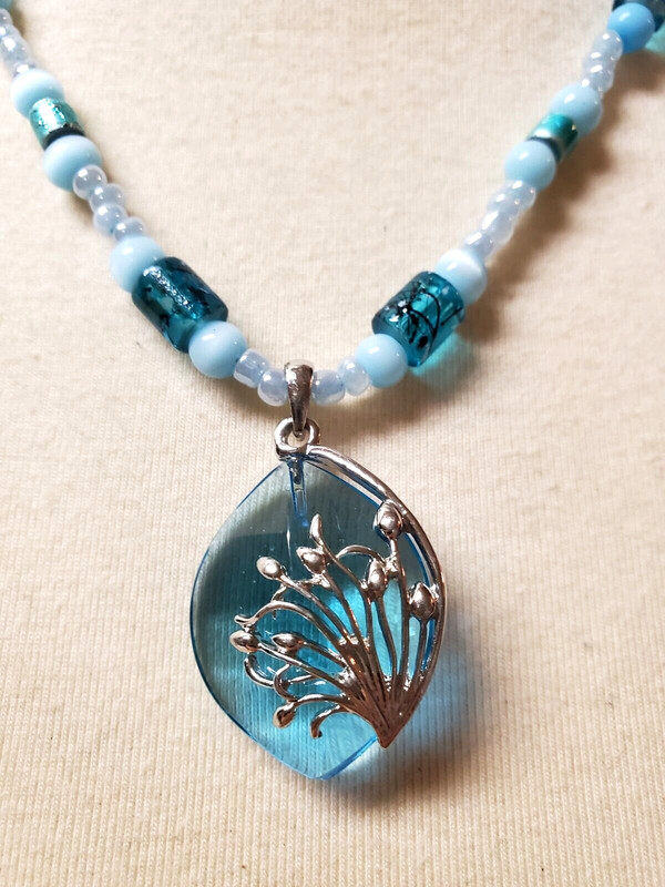 Blue glass pendant necklace intricate, blue cats eye beads, silver tone 18 inch