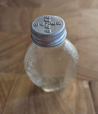 1920s THE BAYER COMPANY ASPIRIN BOTTLE WITH BAYER CROSS EMBLEM ON METAL LID