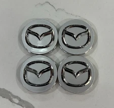 (4 X) MAZDA 56mm Silver Wheel Center Caps Mazda 3/5/6, RX 8, Miata, CX-3/5/7/9