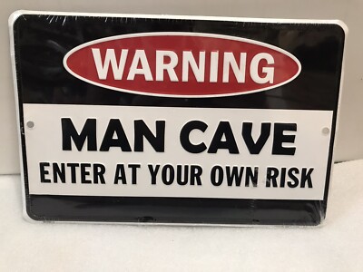 WARNING. MAN CAVE BEER SIGN. ENTER AT YOUR OWN RISK