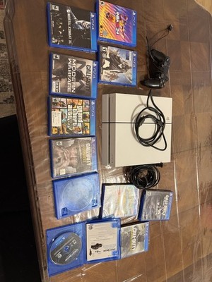 Sony PlayStation 4 Slim with Controller and 11 Games Bundle