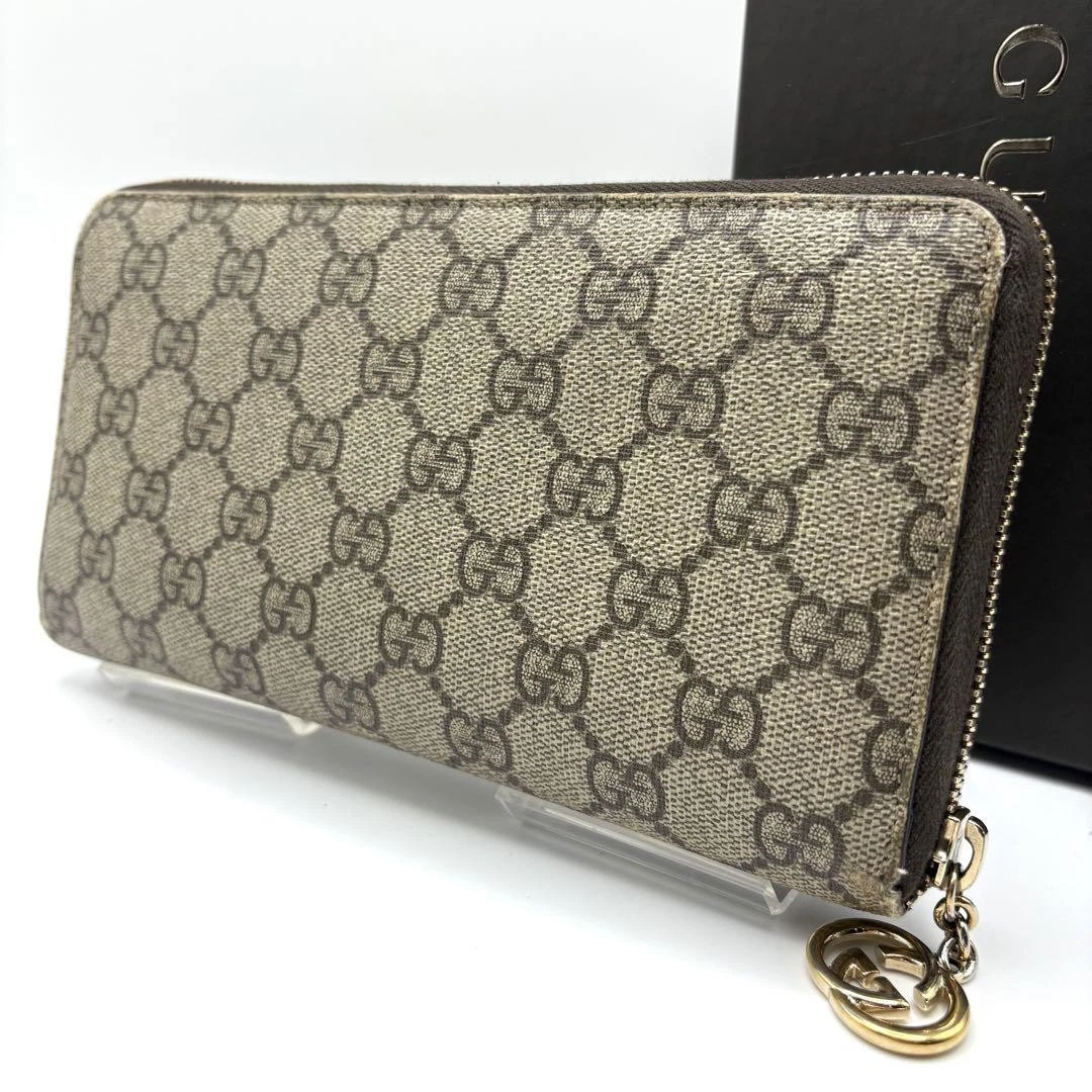 Authentique portefeuille Gucci couleur beige fermeture éclair ronde GG Supreme L21 cm H10,5 cm T2,5 cm