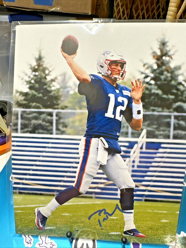 Tom Brady The GOAT 9x11 autographed photo with 11x14 Frame w/mat and COA