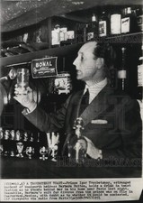 1951 Press Photo Prince Igor Troubetzkoy holds glass, France - pix17884