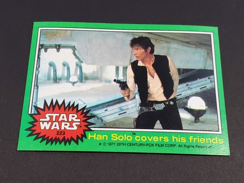 1977 Topps Star Wars #223 Han Solo covers his friends — Raw