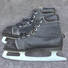 Vintage pair leatcher ice skates child size black decorative winter scene sports