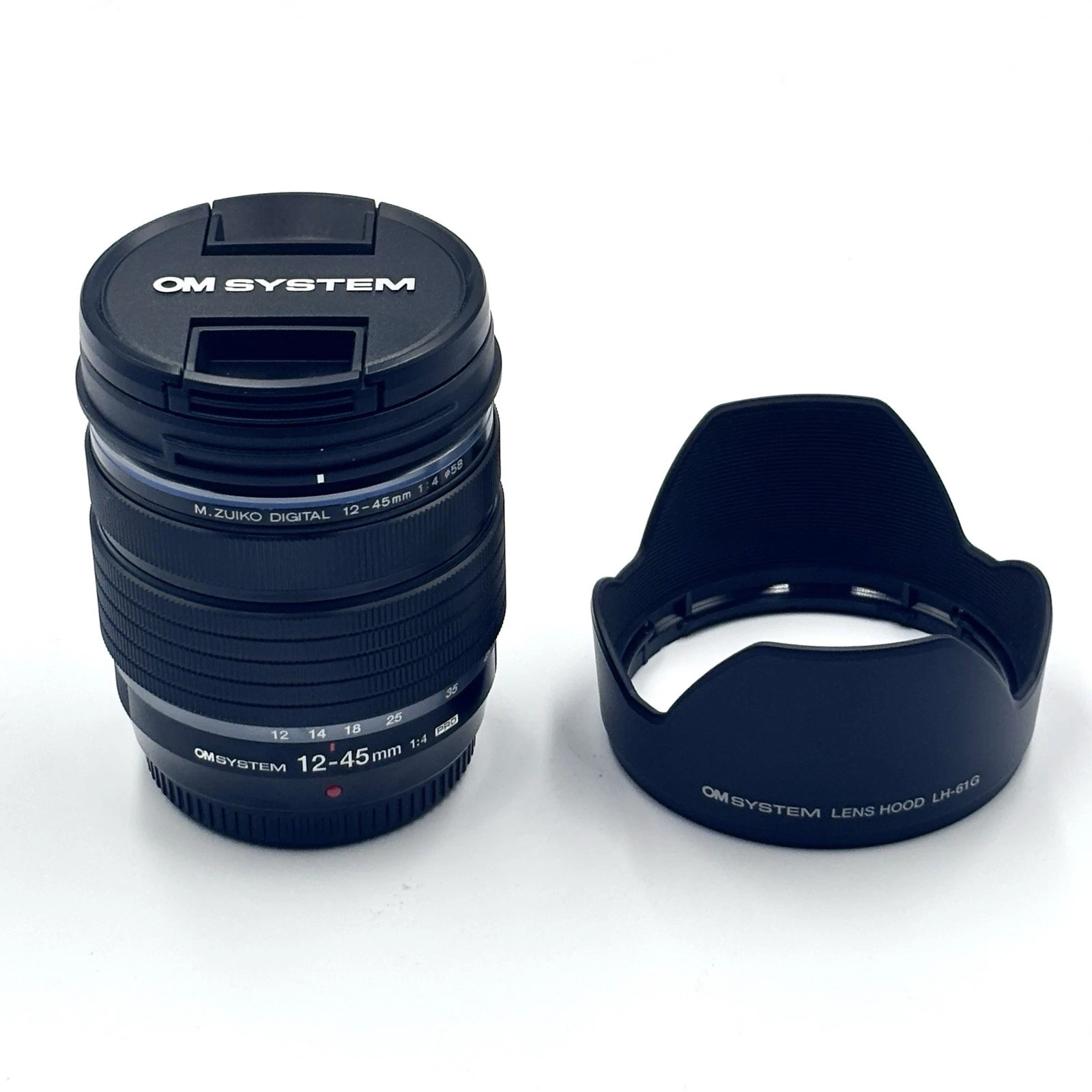 OM SYSTEM M. Zuiko Digital ED 12-45mm F/4.0 PRO Excellent w/Lens Caps and Hood