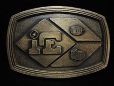 OA01149 NOS VINTAGE 1970s  IE  UNKNOWN COMPANY BRASSTONE BELT BUCKLE