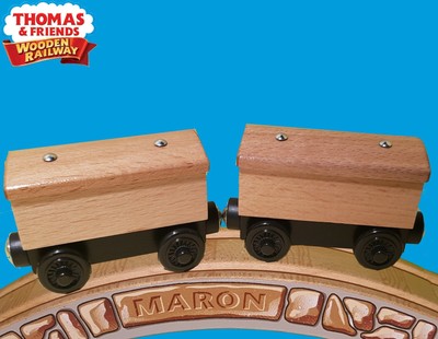 unpainted wooden trains