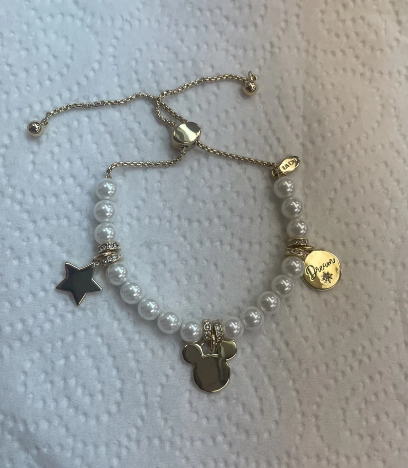 Pulsera Disney Sin Escribir Vidrio Blanco Imitación Perla Chapada en Oro Multi Dijes Foto 2 de 3