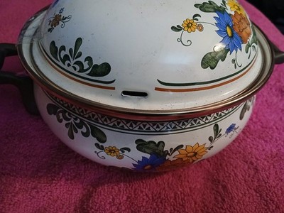 vintage fissler asta enamelware dutch cookware with colorful floral design . 