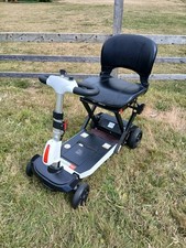 Solax FOLDING scooter. AIR SAFE. LIGHTWEIGHT. RUNS GREAT, needs some bits doing.