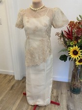 Filipiniana Kultura Asymetrical Blouse Over A Sleeveless Pina Organza Gown