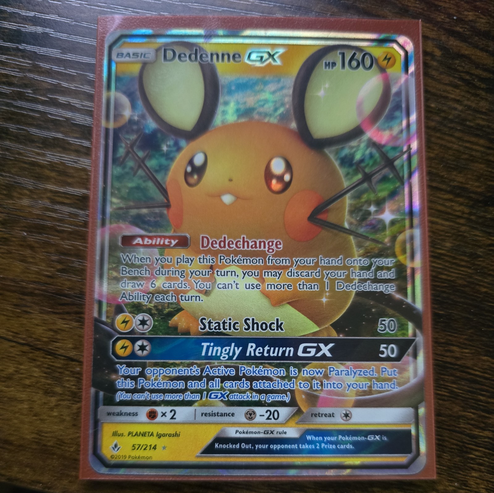 Dedenne GX 57/214 Sm-Unbroken Bonds Holo