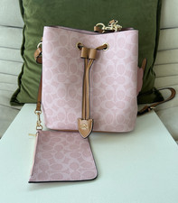 NWOT Coach Rowan Bucket Bag In Signature Canvas With Charms