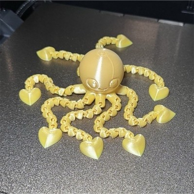 Creality 3D Printer with Articulated Octopus Print and Printed Octopus Model