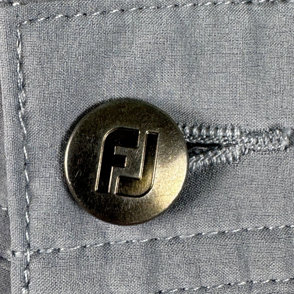 Pantalones Cortos de Golf FootJoy Para Hombres Gris Ligero Rendimiento Frente Plano Talla W34 Foto 3 de 4